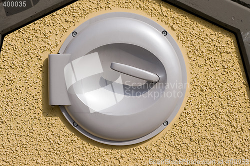 Image of Trash can lid on wall with clipping path
