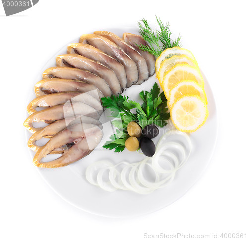 Image of fish with vegetables,anion olives