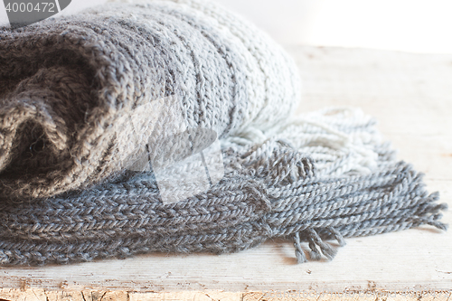 Image of wool grey scarf with tassels