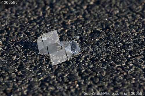 Image of glass on the pavement