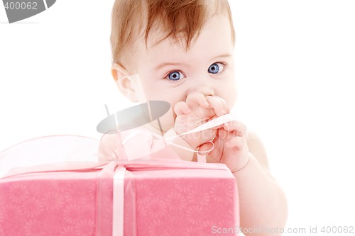 Image of baby boy with gift box