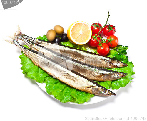 Image of fish with lemon on plate