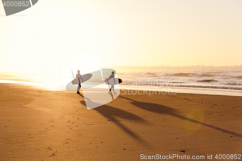 Image of Surfers on the beach