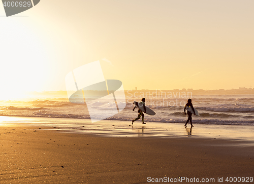 Image of Surfers on the beach