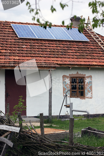 Image of Old antique house with solar panels