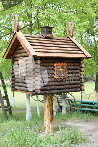 Image of Toy house in the woods . A hut on chicken legs