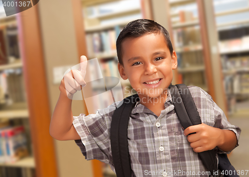 Image of Hispanic Student Boy with Thumbs Up in the Library