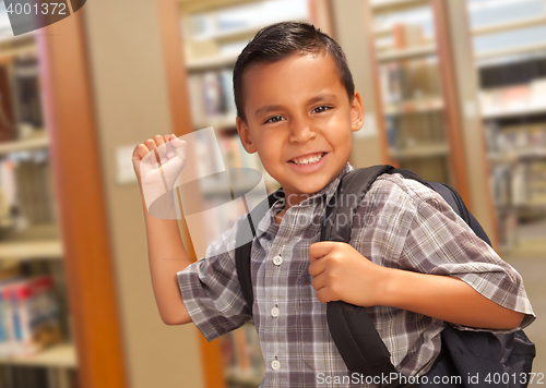 Image of Hispanic Student Boy with Backpack in the Library