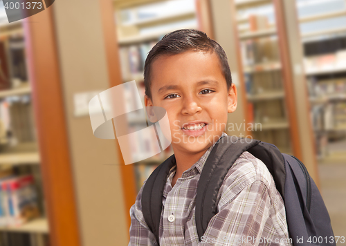 Image of Hispanic Student Boy with Backpack in the Library