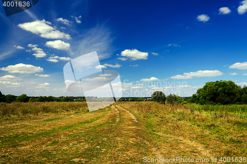 Image of Landscape with dirt road in the countryside