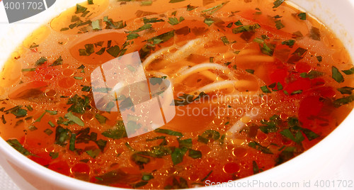 Image of Bowl of Bright Red Creamy Tomato Soup with Yogurt