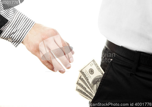 Image of Hand taking money from pocket