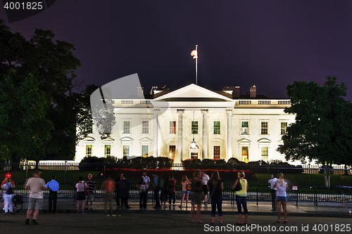 Image of The White House building with tourists in Washington, DC