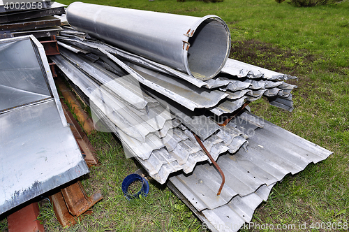Image of Metal parts are dismantled structures stored in the soil on the 