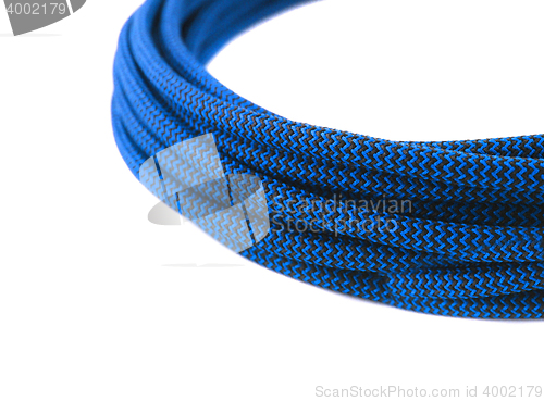 Image of Closeup of blue rope on white background