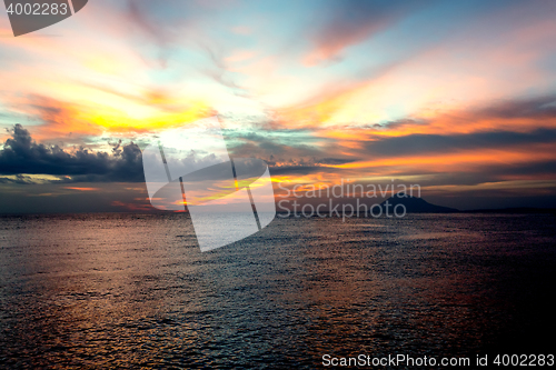 Image of City Manado, North Sulawesi dramatic sky and volcano