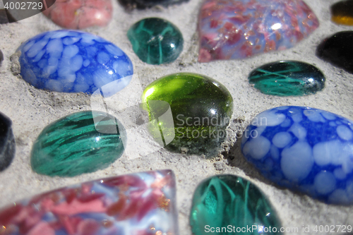 Image of color glass in concrete