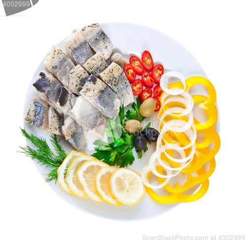 Image of sliced fish with vegetables