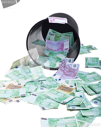 Image of inverted basket of money