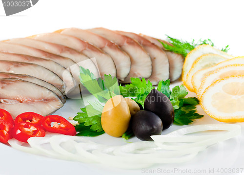 Image of sliced fish with vegetables