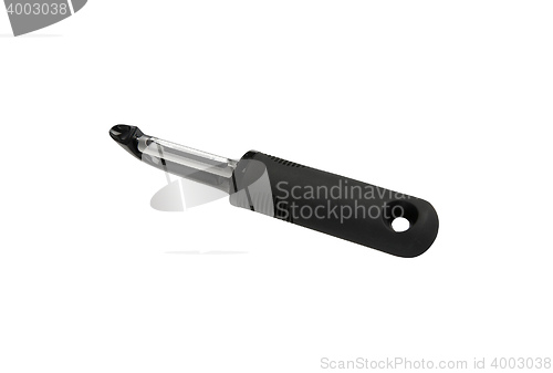 Image of black plastic vegetable peeler isolated on white