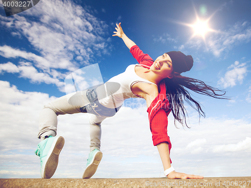 Image of beautiful dancing girl in movement