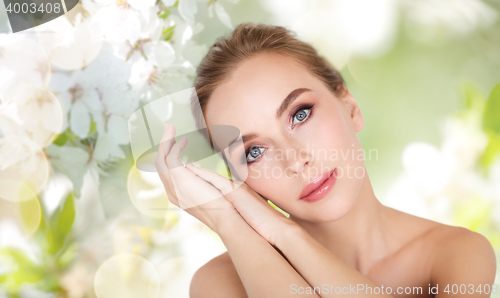 Image of beautiful young woman face and hands