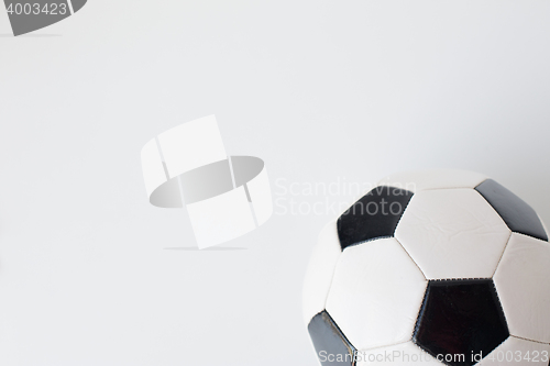 Image of close up of football or soccer ball over white