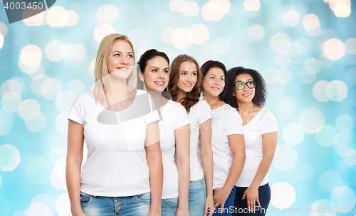 Image of group of happy different women in white t-shirts