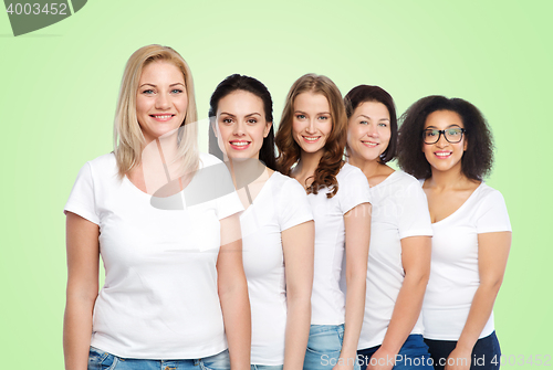 Image of group of happy different women in white t-shirts