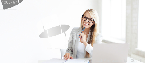 Image of businesswoman with documents