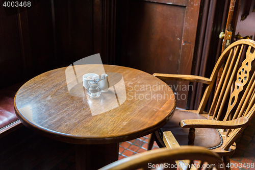 Image of close up of vintage table and chairs in irish pub