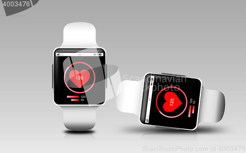 Image of smart watches with heart rate icon on screen