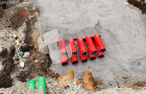 Image of close up of pipes sticking out ground