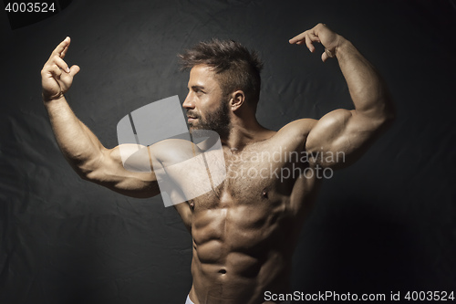 Image of bearded muscular man