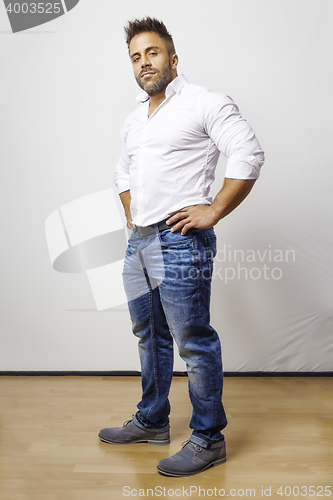 Image of bearded man in blue jeans