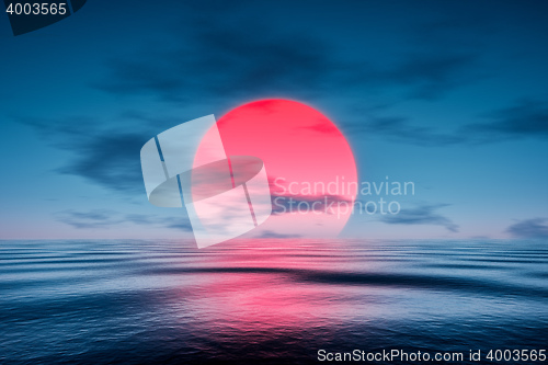 Image of a red sunset over the blue sea