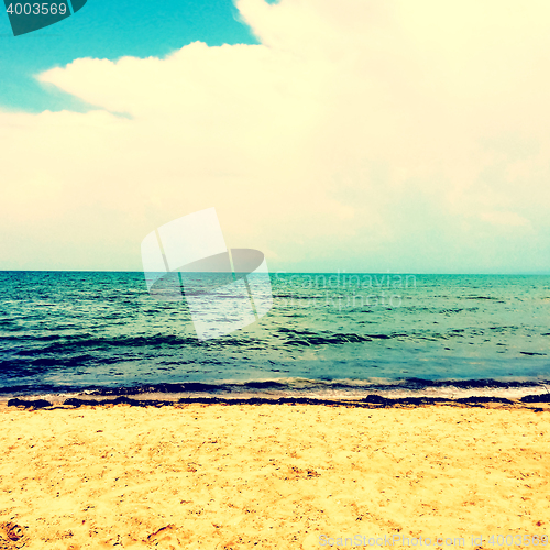 Image of Sea, beach and big white cloud