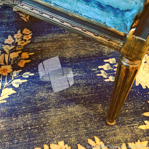 Image of Detail of a vintage style furniture and carpet