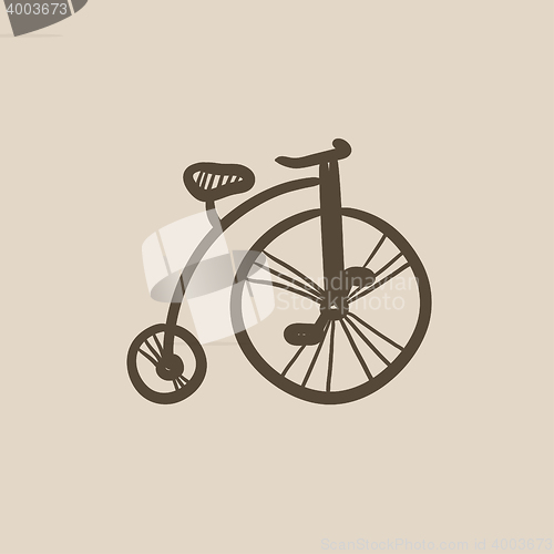 Image of Old bicycle with big wheel sketch icon.