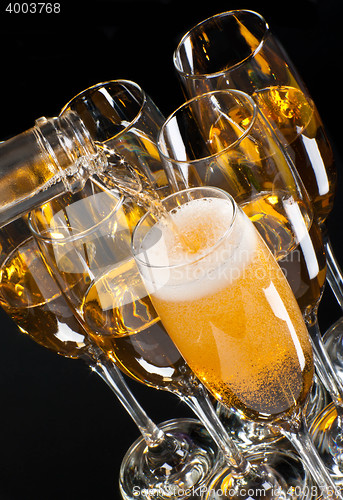 Image of half empty glasses of champagne