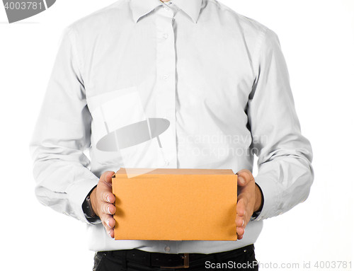 Image of Businessman holding a paper box