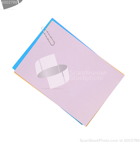 Image of Blank note paper and paper-clip. Isolated