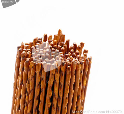 Image of salted pretzel sticks isolated on white