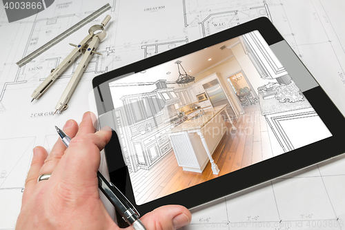 Image of Hand of Architect on Computer Tablet Showing Kitchen Illustratio