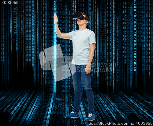 Image of happy man in virtual reality headset or 3d glasses