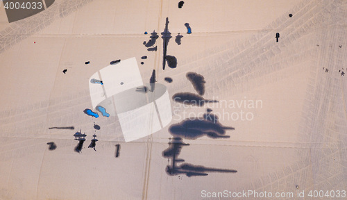 Image of Brown corrugated cardboard with motor oil