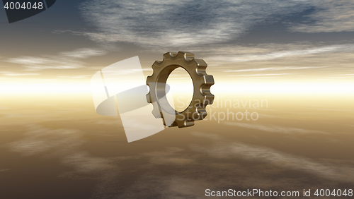 Image of gear wheel under cloudy sky - 3d rendering