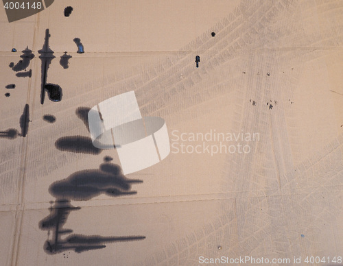 Image of Brown corrugated cardboard with motor oil