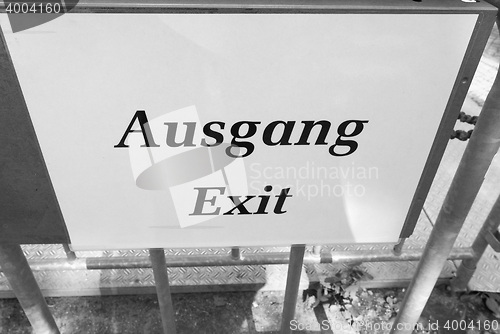 Image of Ausgang sign meaning exit in black and white